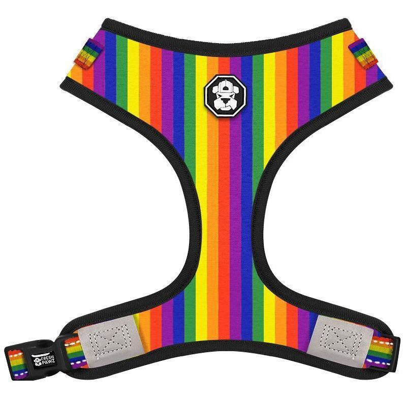 Rainbow striped dog harness with reflective material on a white background