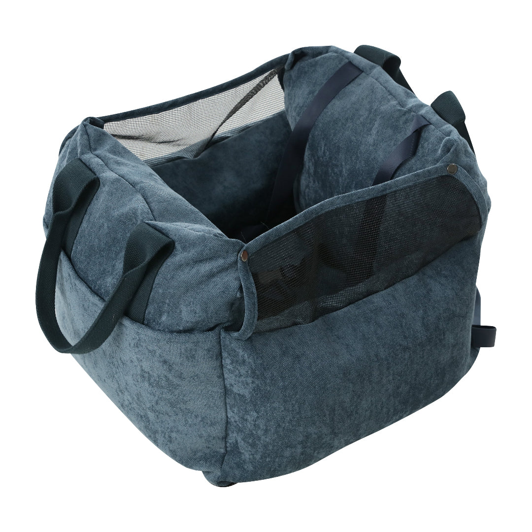 Blue pet carrier with a white background