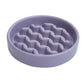 Purple textured pet bowl on a white background