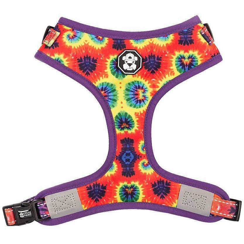 Colorful tie-dye dog harness with purple border on a white background