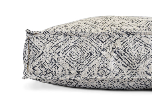 Textured patterned pillow on a white background